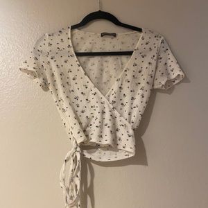 COPY - White floral wrap top.